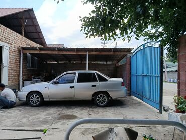 нексия нарын: Серебристый седан Daewoo Nexia - надежный и практичный автомобиль