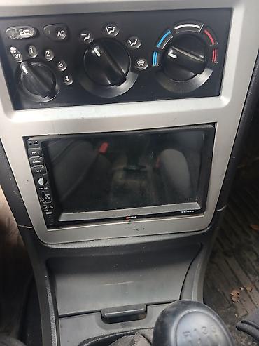Автомагнитолы Clarion 1) Clarion CL-068T (мультимедийная магнитола с