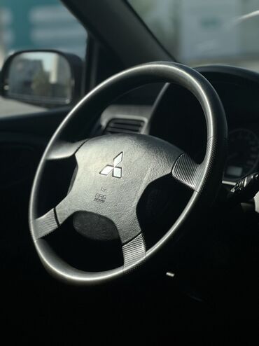 Mitsubishi: Mitsubishi Space Star: 2004 г., Хэтчбэк — 6