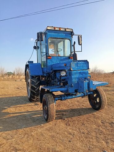 masin ucun soyuducu: Bu universal traktor geniş kənd təsərrüfatı və tikinti işləri üçün