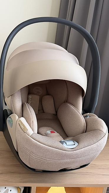 hipseat: Детское автокресло-переноска Cybex (группа 0+) в бежевом цвете — 2