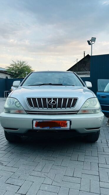 лексус rx 330 новый цена: Автомобиль Lexus RX 300 в серебристом цвете, представленный в кузове