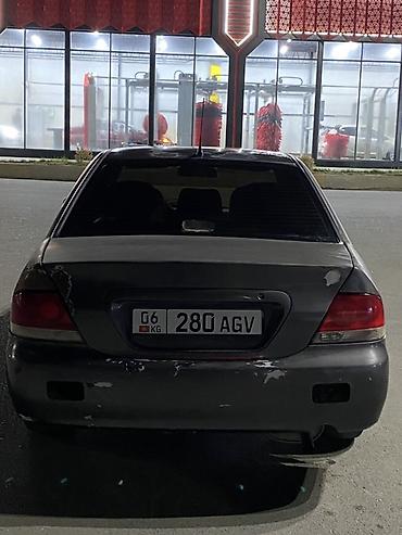 Mitsubishi: Mitsubishi Lancer: 2005 г., 1.6 л, Механика, Бензин, Седан — 5