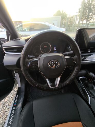 муравей колесо: Toyota Corolla: 2021 г., 1.8 л, Автомат, Гибрид, Седан