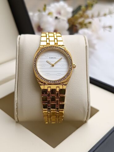 tek qaş üzüklər: Gucci qadın qol saatı - Korpus: qızılı tonlu paslanmayan polad, bezel