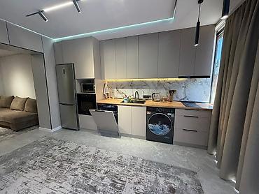 гостинный дом: Дизайнерская квартира с современной кухней-гостиной и спальней. Село — 1