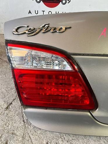 vq20: Фонарь заднего хода NISSAN Cefiro GF-A33 VQ20(DE) 2 2000 лев. (б/у) — 1