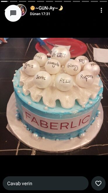 Bal: Mavi rəngli krem ilə örtülmüş Faberlic yazılı bəzəkli tort. Tortun