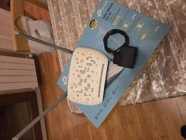 cisco modem: TP-Link 300 Mbps Wi‑Fi ADSL2+ Modem Router - Model: TP-Link ADSL2+ — 1