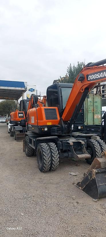 трактор погрущик: Экскаватор, Doosan, 2021 г., Колесный — 2