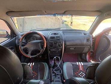 буу донголок chevrolet malibu шина: Mitsubishi Carisma: 1998 г., Седан — 10