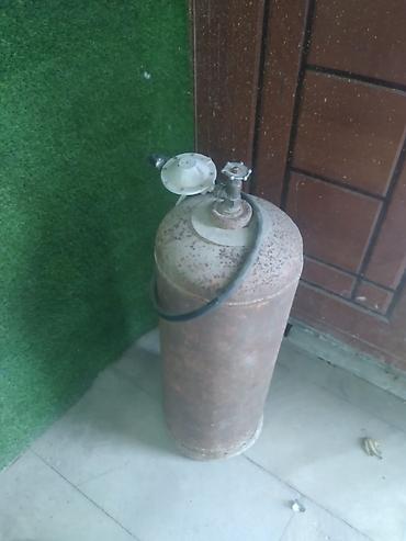 Газовые баллоны: Qaz balonu satılır. Metal gövdəli silindr formalı balondur. Üst — 1