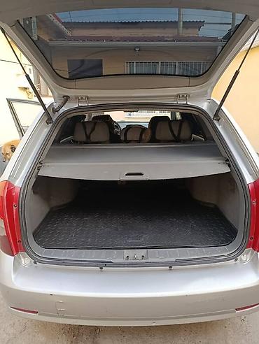 Suzuki: Suzuki Forenza / Reno: 2006 г., 2 л, Автомат, Газ, Универсал — 8