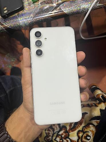 Мобильные телефоны: Samsung Galaxy A54 5G, 128 ГБ, цвет - Белый — 2