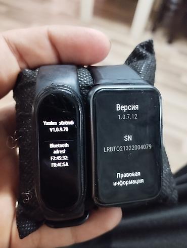 Saat dəstləri: Huawei TIA-B09 Biri Isə Xiomi Mi Band-4 du Her ikiside Orginal Saatdi — 6