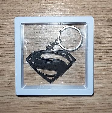 Breloklar: SuperMan loqolu açarlıq. - Material: metal (qara rəngli asma və — 1