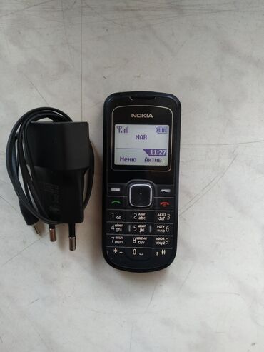 Nokia: Nokia 1202 Sadə Xudmani Orjinal teli Korpusu dəyişilməyib Ela