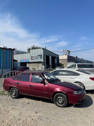 купить новый двигатель дэу нексия 1.5 8 клапанов: Седан Daewoo Nexia бордового цвета, оснащенный бензиновым двигателем