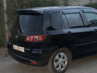 спорт машины: Mazda Demio: 2003 г., 1.3 л, Автомат, Бензин