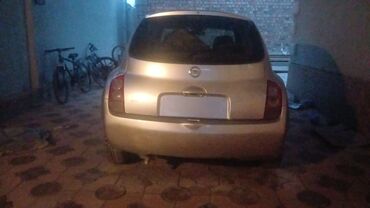 купить диски r16 4x114.3: Серебристый хэтчбек Nissan Micra, модель K12, оснащенный четырьмя