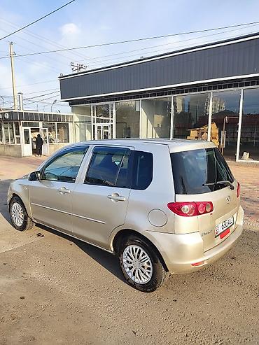 митсубиши спейс стар: Mazda Demio: 2004 г., Автомат, Бензин — 4