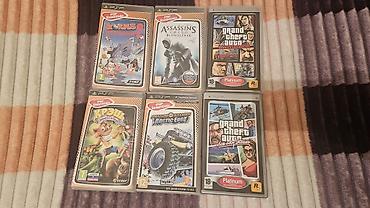 psp konsol: PSP üçün disclər satılır Wormsdan başqa hamısının içində kitabçaları — 1