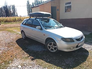 авто салон: Mazda 323: 2002 г., 1.6 л, Механика, Бензин, Универсал — 1
