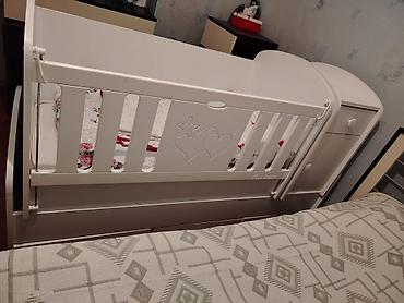 Beşiklər: Ağ rəngdə uşaq beşiyi – yan tərəfi sürüşdürülüb açılan model. Klassik — 4