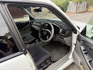 ск шерой: Subaru Forester: 2000 г., 2 л, Автомат, Бензин, Универсал — 1