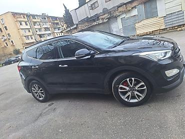 ford focus hatchback: Hyundai Santa Fe: 2 l | 2014 il Krossover — 4