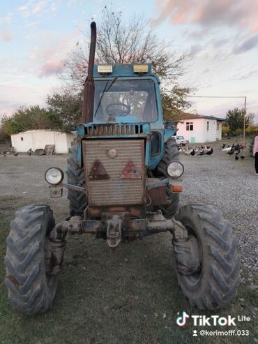 Traktorlar: Mavi rəngli təkərli kənd təsərrüfatı traktoru - Korpus: kabinalı — 4