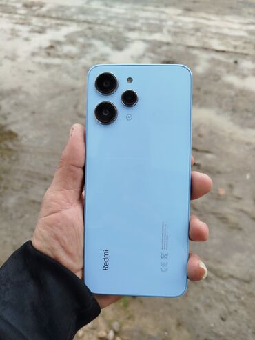 300 manatlıq telefonlar: Xiaomi Redmi 12, 256 ГБ, цвет - Синий, 
 Отпечаток пальца, Две SIM карты