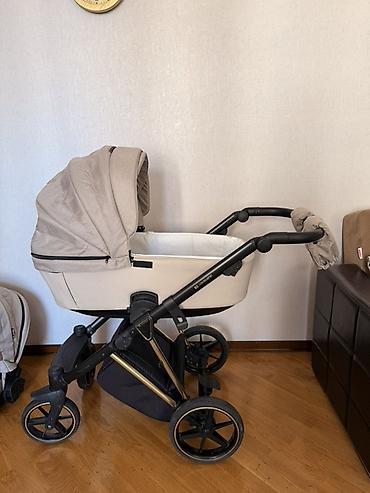 Modullu arabalar: Uşaq arabası 2‑də‑1 (körpə beşiyi + oturacaq bloku) Adamex markasıdır — 14