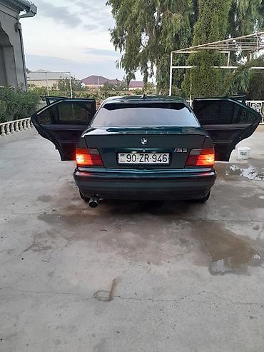 s class fara: BMW sedan, yaşıl-mavi (tünd petrol) rəng. E36 kuzov. - 4 qapı, salon — 9