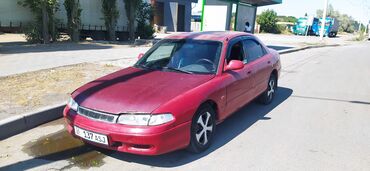 tayota runx: Mazda Cronos: 1992 г., 2 л, Механика, Бензин, Седан