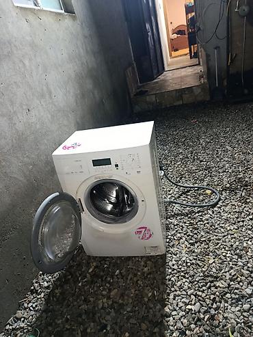hamam peci: Öndən yükləməli paltaryuyan maşın. Şəkillərdə görünən xüsusiyyətlər — 1