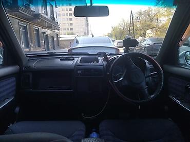 var: Nissan Cube: 2000 г., 1.3 л, Вариатор — 4