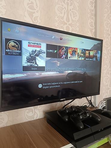 ремонт плейстейшен 5: Sony PlayStation 4 (PS4) – Fat model, qara rəng Komplekt: - PS4 — 2