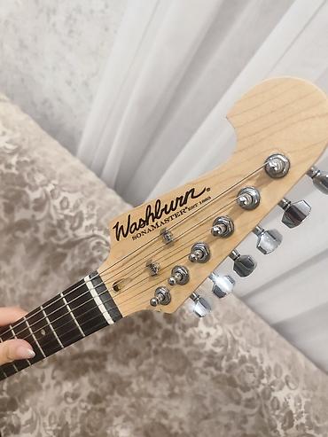 gitara elektro: 1 ildir alinmisdir, usaq istifadə edə bilmədiyindən təcili satilir — 2