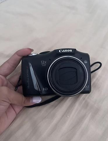 archer a6: Компактная камера Canon PowerShot SX150 IS - Матрица 14.1 Мп. - — 1