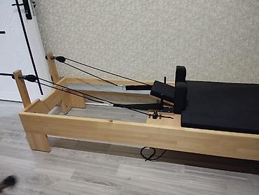 ferro qaçış aparatı: Pilates Reformer trenajoru – taxta karkaslı, tənzimlənən yay müqavimət — 1