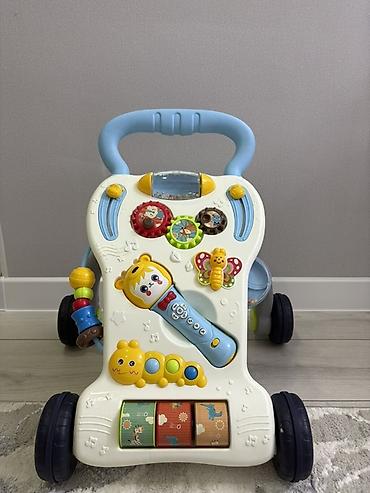 Детские ходунки: Развивающая каталка-ходунки для малышей - Устойчивая конструкция на 4 — 2