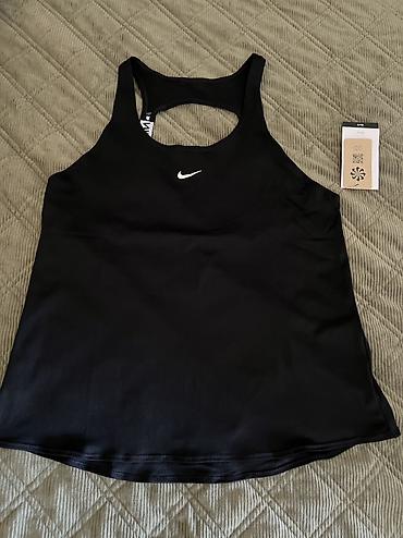 aksa: Nike Pro Women's Dri-FIT Tank Top vel. S, M 
Recycled Materials
IB — 6