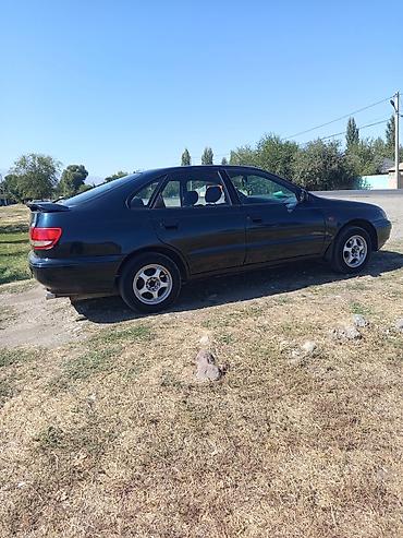 дайхатсу мира: Toyota Carina E: 1996 г., Механика, Бензин, Седан — 2