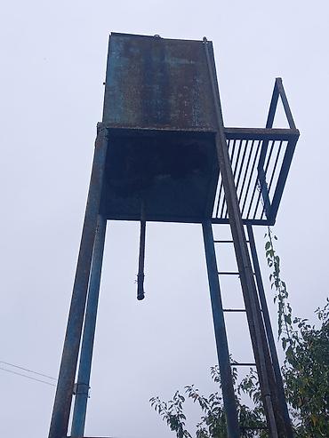 ev saatlari: Metall su çəni və dayaq konstruksiyası - Material: qalın divarlı — 2