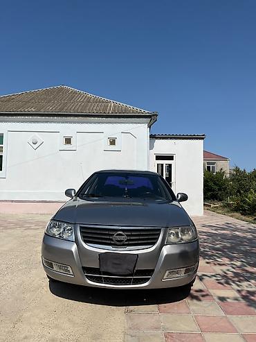 masin cip: Nissan Sunny: 1.6 l | 2008 il Sedan — 1