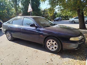 курсовой сапок: Mazda 626: 1992 г., 2 л, Механика, Газ, Лифтбек — 1