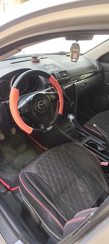 bud e9: Mazda 3: 2005 г., 2 л, Механика, Бензин, Хэтчбэк — 9