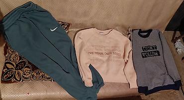 ayaqqabı nike: Uşaq geyim dəsti – 3 parçalı Məhsul tərkibi: - Tünd mavi-yaşıl rəngdə — 1