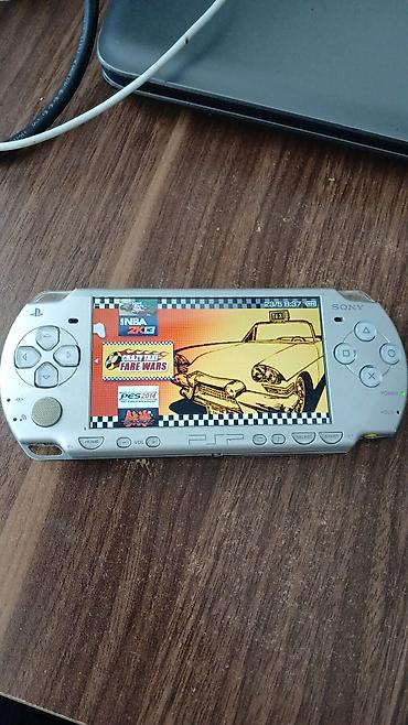 nintendo switch ikinci el: Sony PSP portativ oyun konsolu – gümüş rəng Xüsusiyyətlər: - 4.3 düym — 2